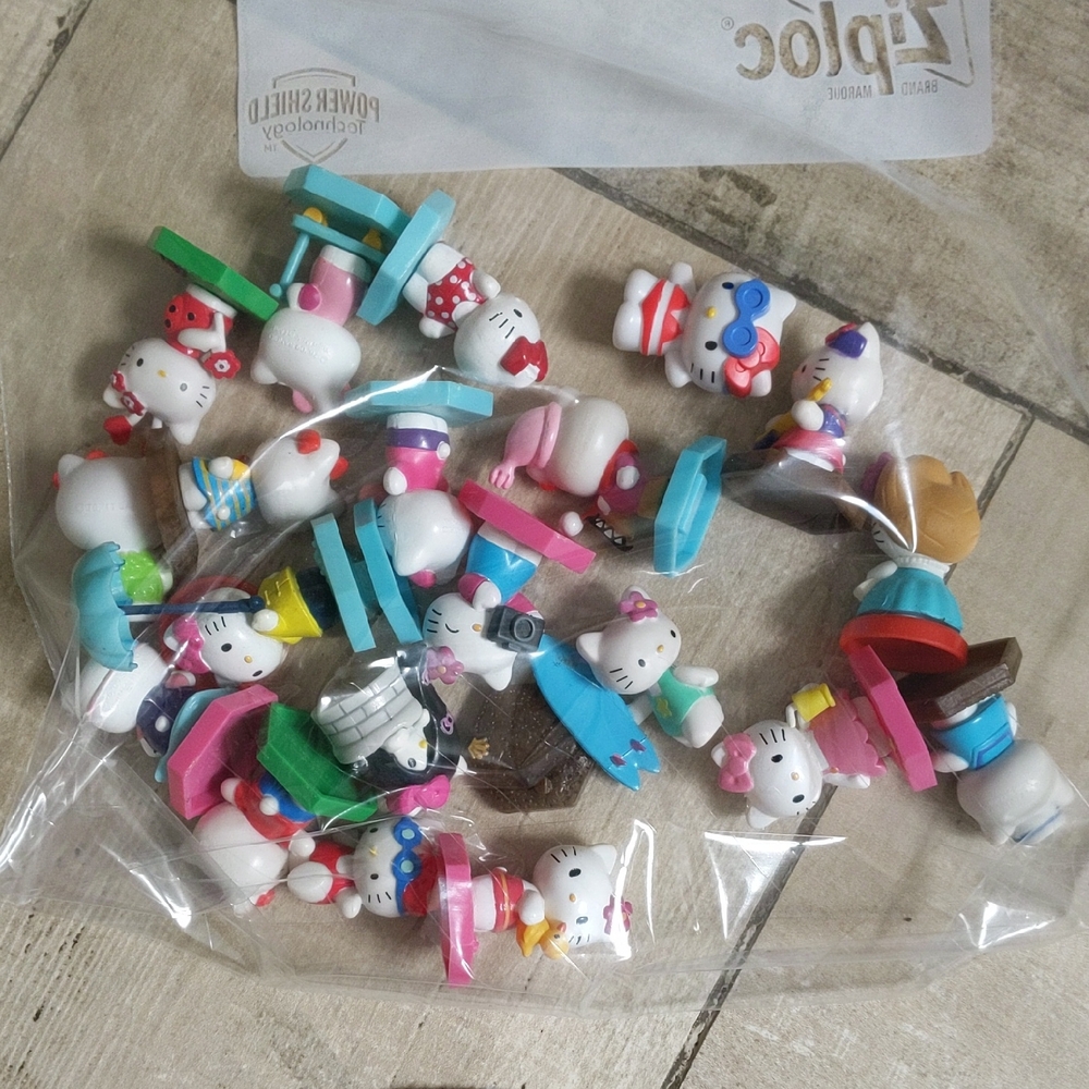Lot Of Hello Kitty Plastic Figurines With Hexagon Bases